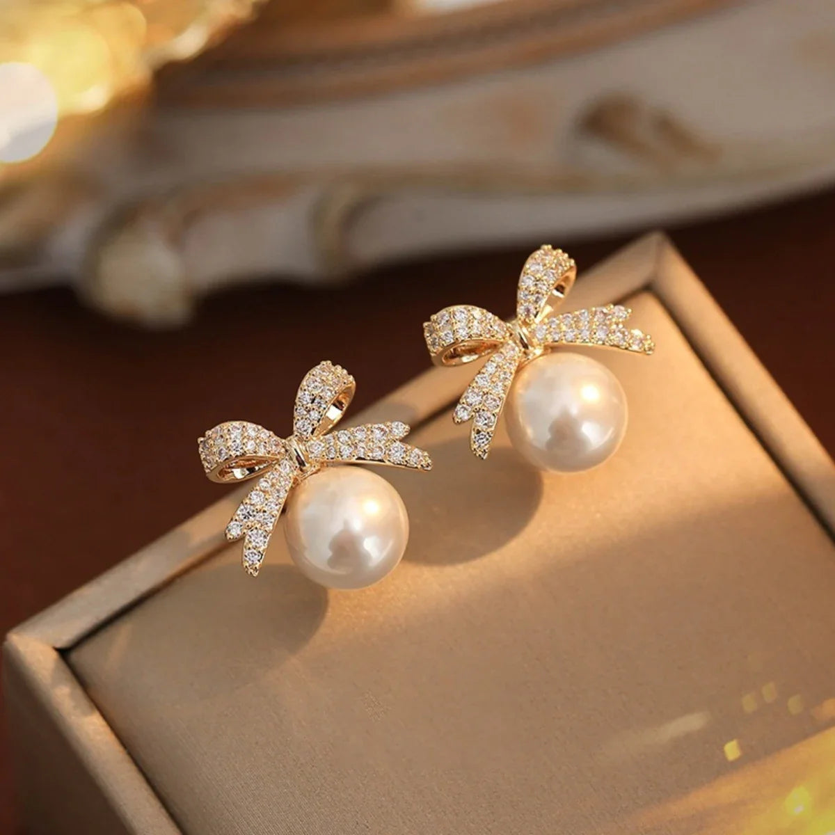 Women’s Silver Bow Earrings with Diamond Pearl – Fashionable High-End Studs
