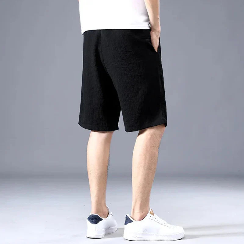 Men’s Ice Silk Sports Shorts – Loose, Breathable Cropped Pants for Casual Wear (XL-XXXL)