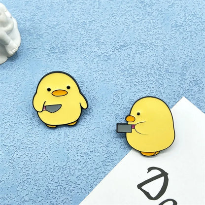 Cute Yellow Duck with Knife Enamel Brooch – Fun Cartoon Metal Pin, Creative Personality Badge & Best Friend Gift