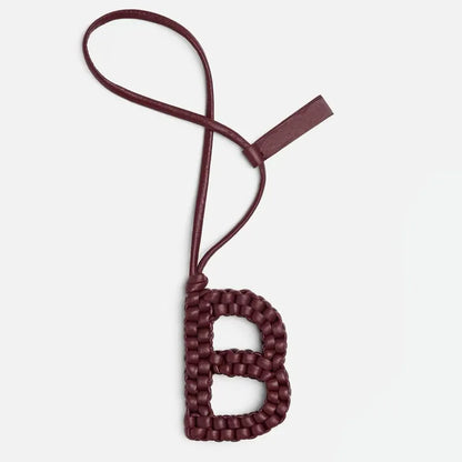 Woven Leather Letter Bag Charm – Luxury Handwoven Pendant Ornament for Women’s Handbags, Fashionable Bag Decoration Accessory