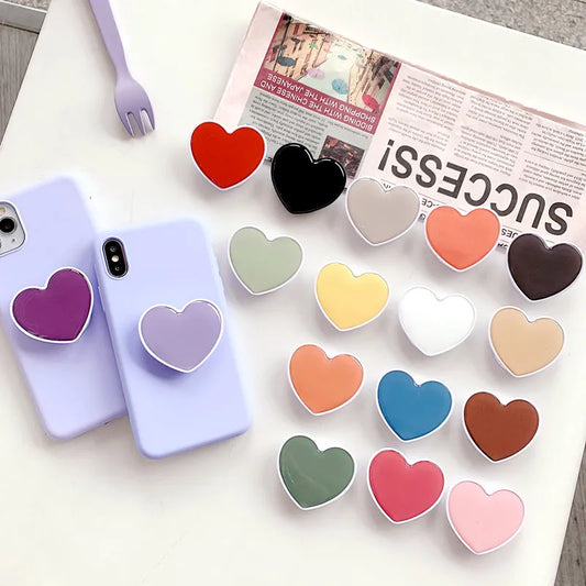 Universal Heart-Shaped Phone Socket Holder: Finger Grip Bracket Support for iPhone 15, 14, 13, Samsung - Pocket Socket Stand