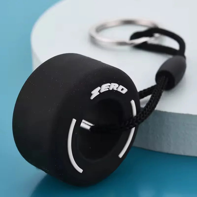 Mini F1 Racing Tire Keychain – Luxury Car Key Accessory & PVC Tire Pendant for Men, Car Lovers & Gifts