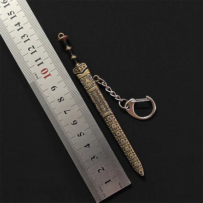 Mini Sword Pendant Keychain – Creative Weapon Toy Key Ring for Backpack & Gifts
