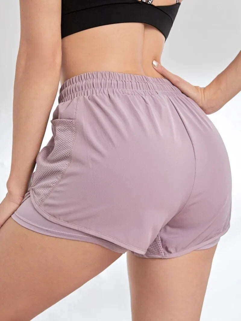 Women’s Elastic Sports Shorts with Pockets – Two-in-One Yoga Leggings for Running & Training