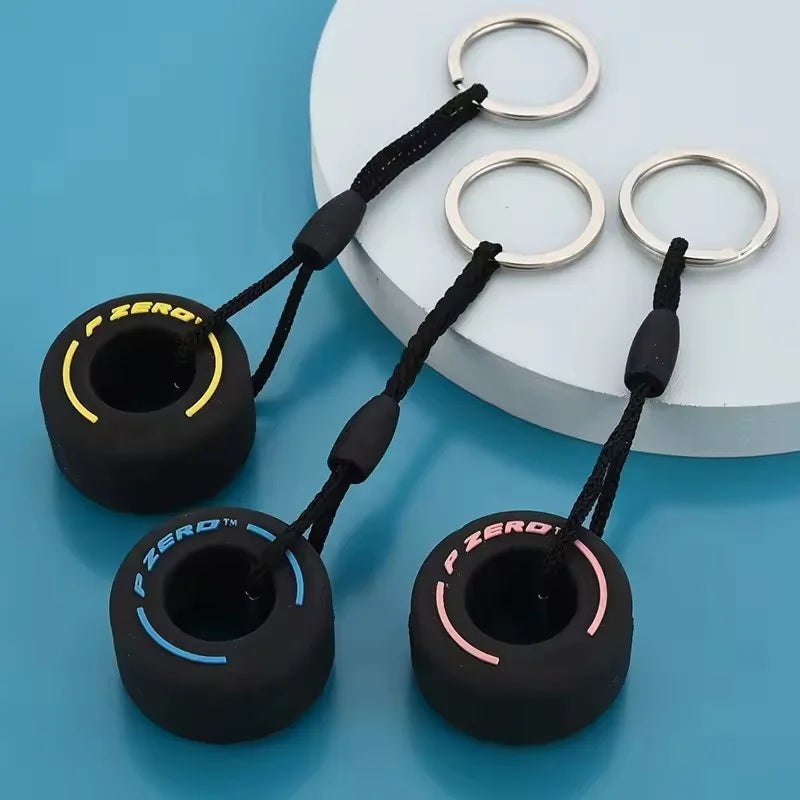 Mini F1 Racing Tire Keychain – Luxury Car Key Accessory & PVC Tire Pendant for Men, Car Lovers & Gifts
