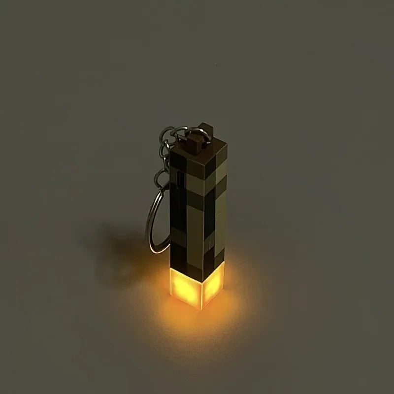 Glow-in-the-Dark Anime Gamer Keychain – Classic Torch Design with Pixelated Wooden Texture Plastic Pendant