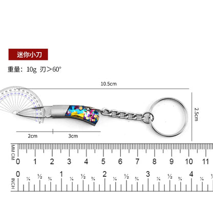 5cm Mini Folding Knife Keychain – Acrylic & Brass Portable Blade Pendant for Camping, Outdoor, and Everyday Carry