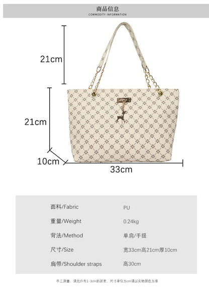 Women’s Large Capacity PU Leather Handbag — Fashion Tote Bag with Textured Design and Hanging Accessories