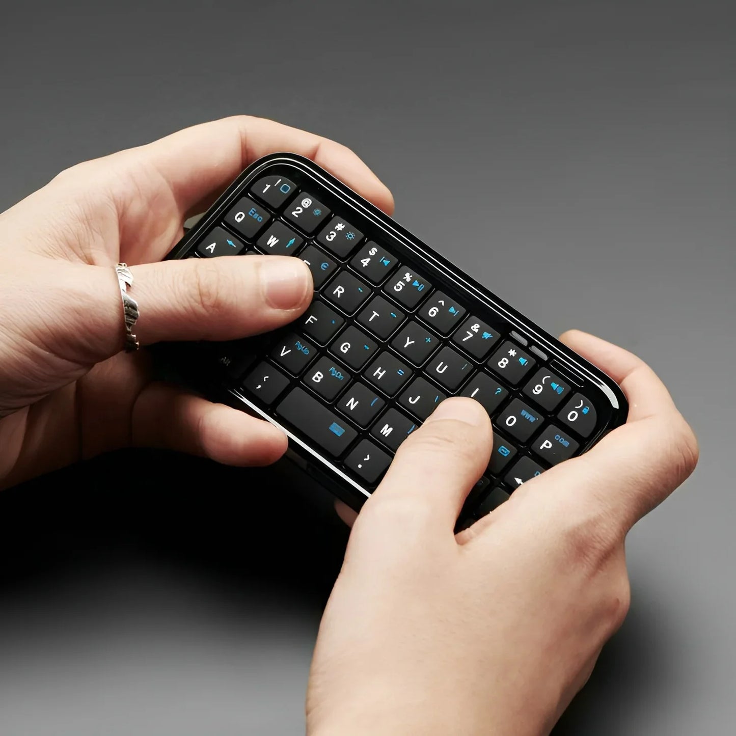 Mini Rechargeable Type-C Bluetooth 3.0 Keyboard – Slim 49-Key Wireless Keypad for Tablets & Smartphones