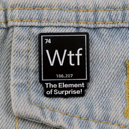 The Element of Surprise Enamel Pin — Black WTF Lapel Pin for Backpacks & Clothing
