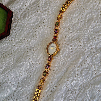 Luxury Women's Watch – Oval Mother-of-Pearl Dial with Tourmalines & Diamond Accents ✨⌚