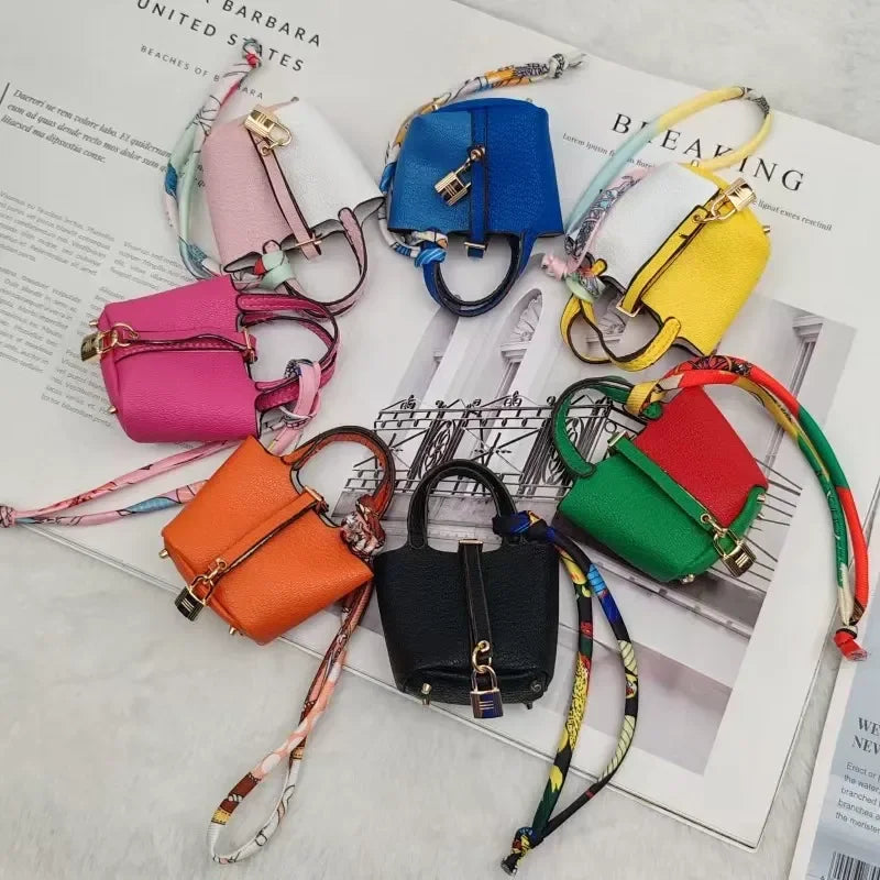 Mini Bag Pendant Keychain – Creative Portable Zero Wallet, Bracelet, and Bluetooth Earphone Multifunctional Hanging Accessory