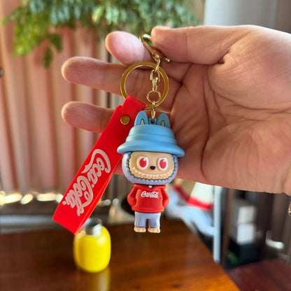 12pcs Labubu Monster Coca Cola Mini Doll Keychains — 4 Styles Action Figures for Kids