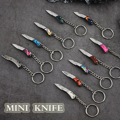 5cm Mini Folding Knife Keychain – Acrylic & Brass Portable Blade Pendant for Camping, Outdoor, and Everyday Carry