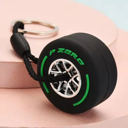 Mini F1 Racing Tire Keychain – Luxury Car Key Accessory & PVC Tire Pendant for Men, Car Lovers & Gifts