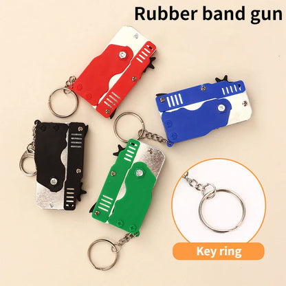 Mini Metal Gun Keychain – Folding Pistol Toy for Kids, Car Styling & Outdoor Gift
