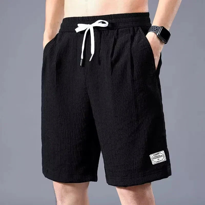 Men’s Ice Silk Sports Shorts – Loose, Breathable Cropped Pants for Casual Wear (XL-XXXL)