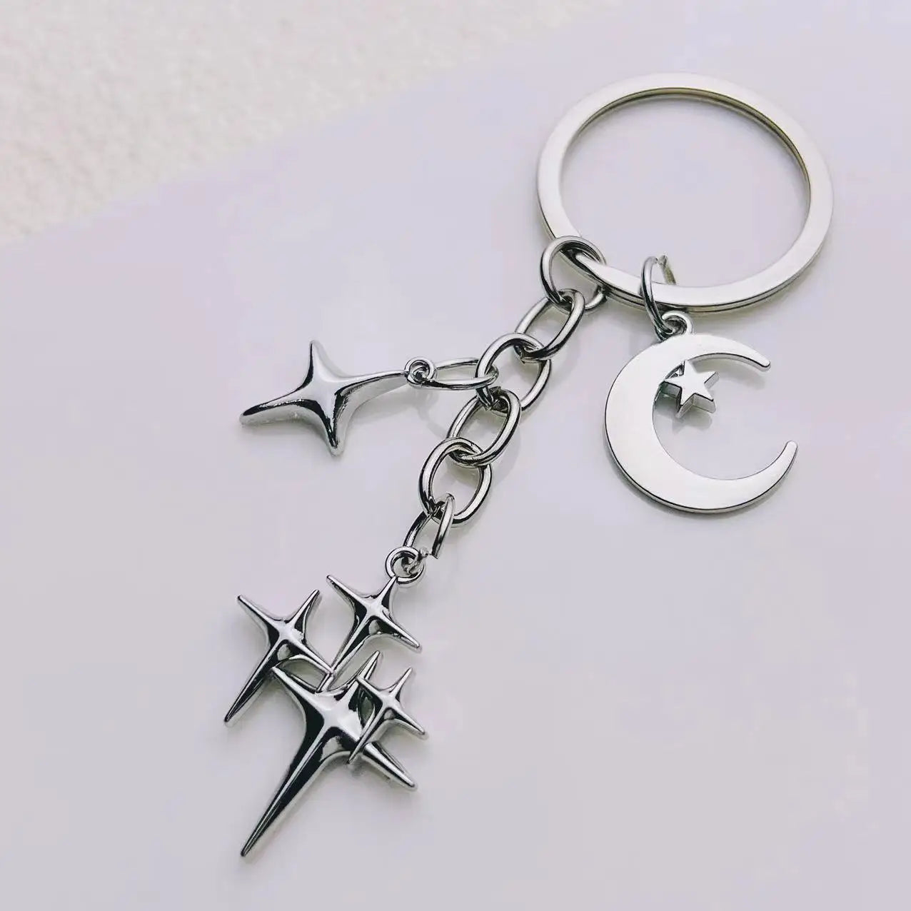 Star & Moon Alloy Keychain Pendant – Creative Four-Pointed Star Key Ring Bag Backpack Charm for Women & Men Jewelry Gift Accessories