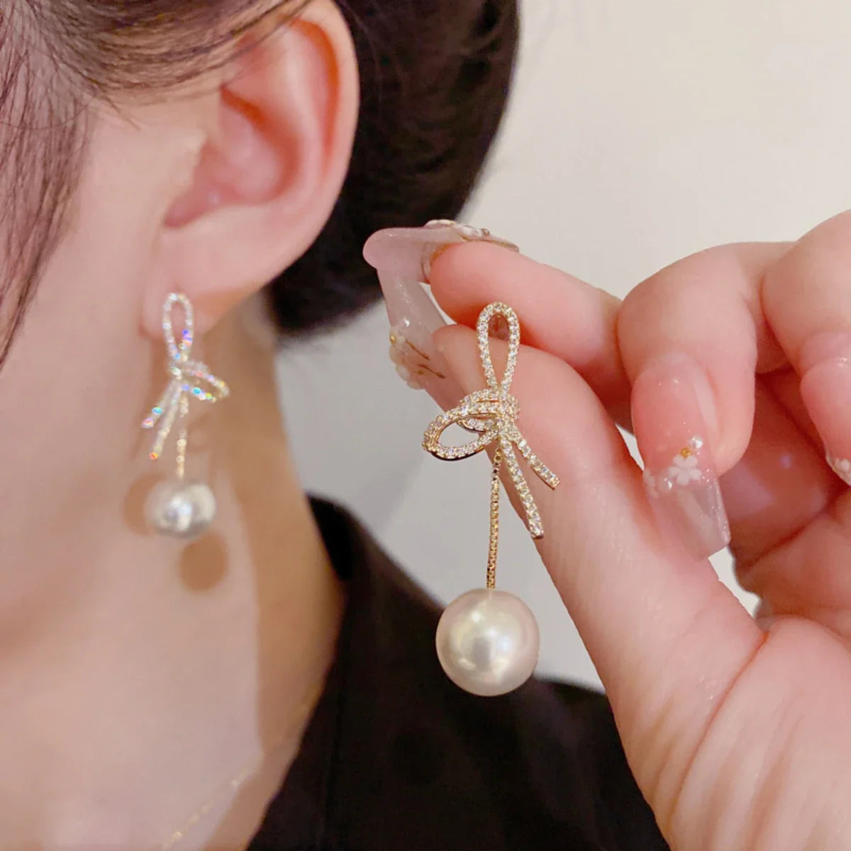 Women’s Silver Bow Earrings with Diamond Pearl – Fashionable High-End Studs