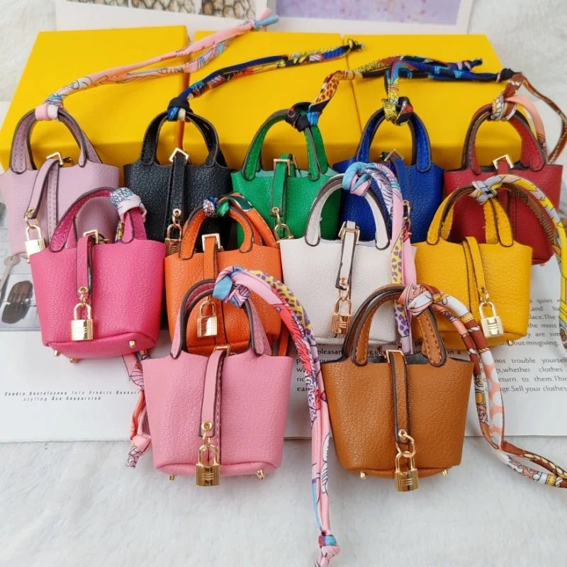 Mini Bag Pendant Keychain – Creative Portable Zero Wallet, Bracelet, and Bluetooth Earphone Multifunctional Hanging Accessory