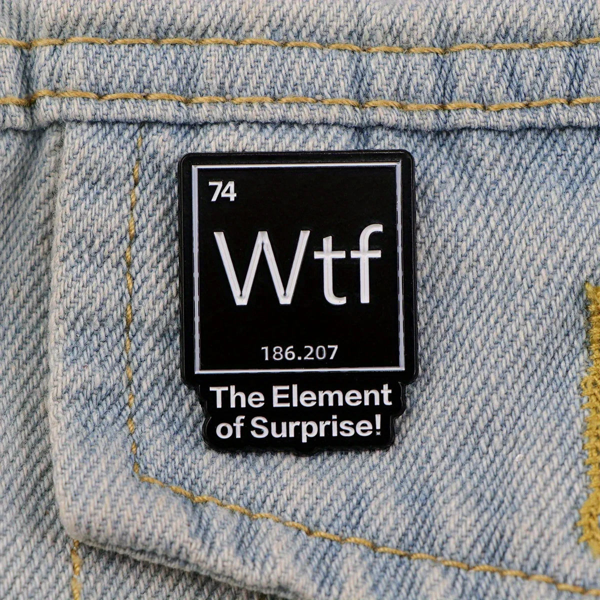 The Element of Surprise Enamel Pin — Black WTF Lapel Pin for Backpacks & Clothing