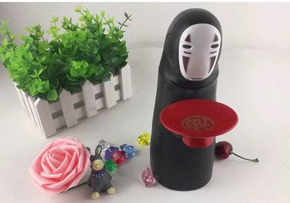 Cute Faceless Cartoon Male Piggy Bank – Spirited Away Inspired Electric Coin Bank for Living Room Decoration & Gifts