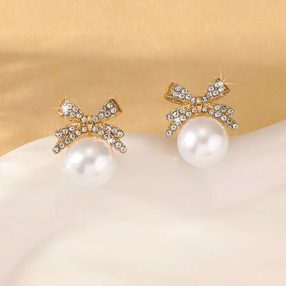 Women’s Silver Bow Earrings with Diamond Pearl – Fashionable High-End Studs