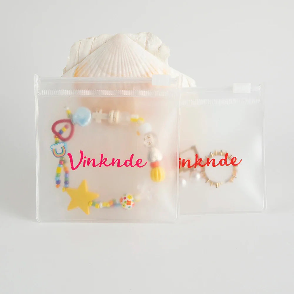 200PCS Bulk Jewelry Zipper Bags — Custom Frosted Transparent PVC Pouches for Necklaces, Earrings & Rings with Logo