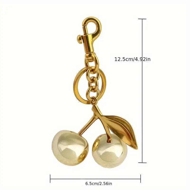 Golden Cherry Keychain Charm — Shiny Resin & Metal Bag Accessory, Elegant Gift for Women