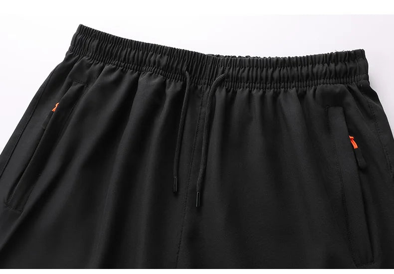YJKVUR Men’s Athletic Workout Shorts – 2024 New Gym Training & Running Shorts with Pockets (M-8XL)