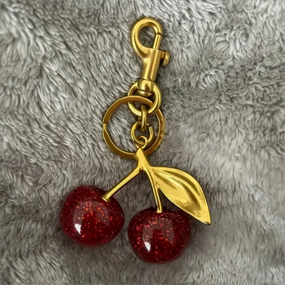 Golden Cherry Keychain Charm — Shiny Resin & Metal Bag Accessory, Elegant Gift for Women
