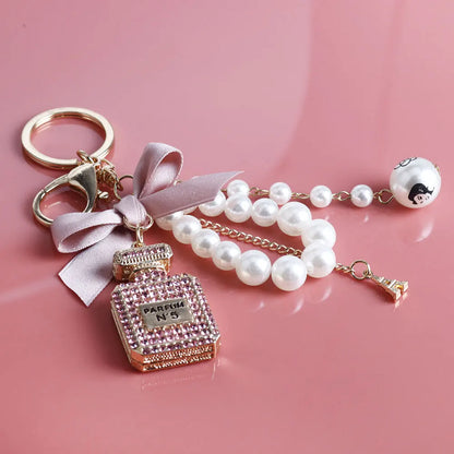 Fashion Pearl Perfume Bottle Keychain — Cute Bow Car & Bag Charm for Women, Creative Key Ring Accessory