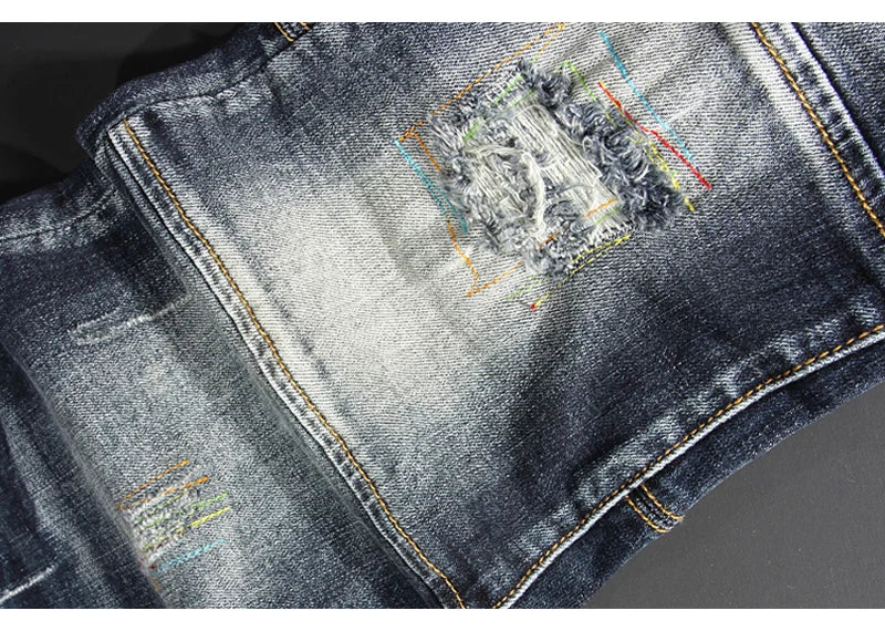 Streetwear Men’s Slim Fit Ripped Jeans – Retro Black & Blue Spliced Denim with Designer Embroidery, Hip Hop Fashion