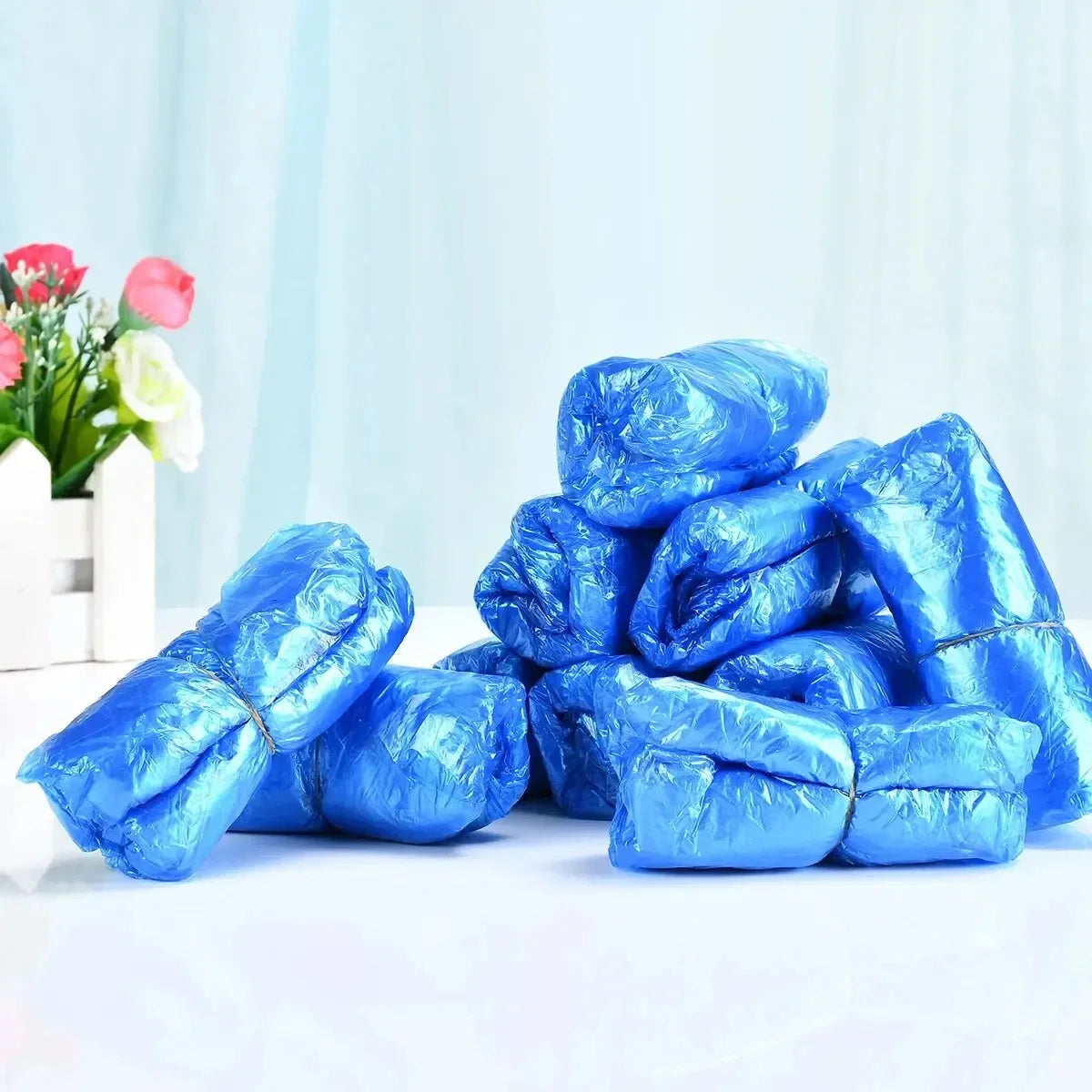 100pcs Disposable Waterproof Boot Covers – Non-Slip, Plastic Overshoes for Rain & Mud Protection