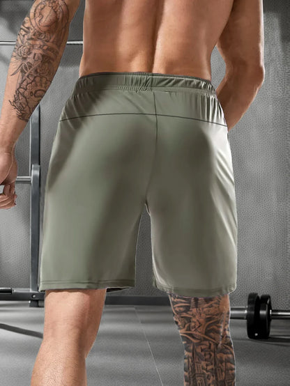 Men’s Solid Color Casual Shorts – Elastic Waist with Drawstring and Zipper Pockets, Loose Fit High Elasticity