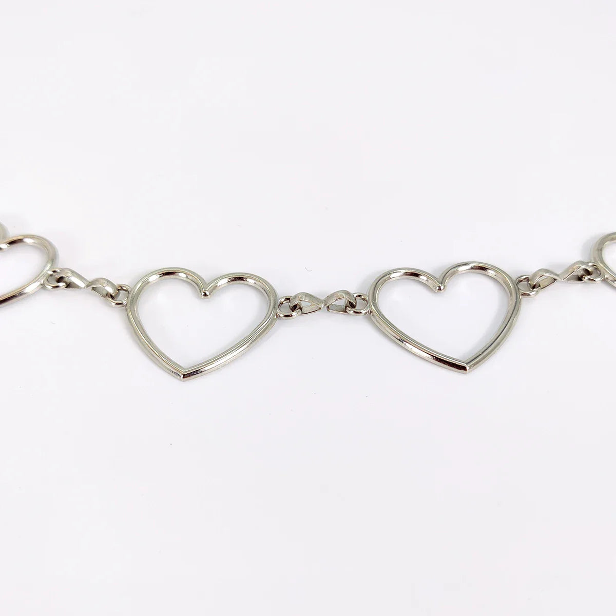 Women's Luxury Heart-Shaped Metal Waist Chain Belt – Y2K Goth Punk Accessory for Jeans & Dresses