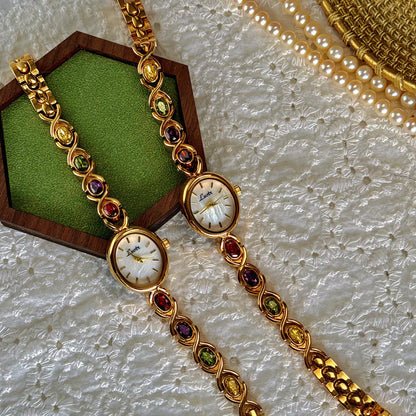 Luxury Women's Watch – Oval Mother-of-Pearl Dial with Tourmalines & Diamond Accents ✨⌚