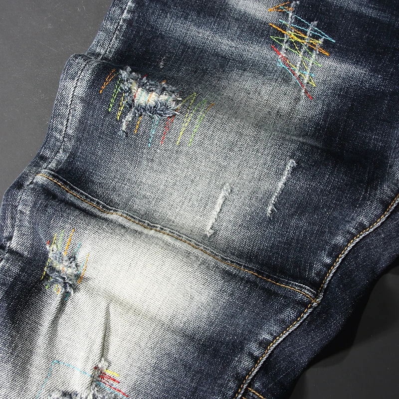 Streetwear Men’s Slim Fit Ripped Jeans – Retro Black & Blue Spliced Denim with Designer Embroidery, Hip Hop Fashion