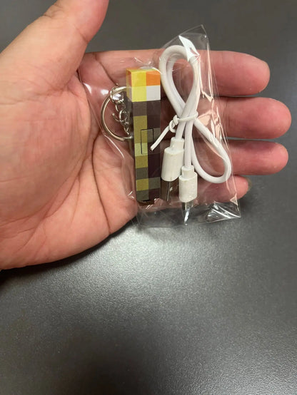 Glow-in-the-Dark Anime Gamer Keychain – Classic Torch Design with Pixelated Wooden Texture Plastic Pendant