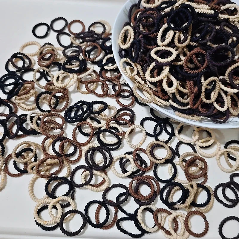 [100 Pack] Baby Rubber Bands - High Elastic, Seamless Thumb Rings for Toddlers, Gentle on Hair Scrunchies Set