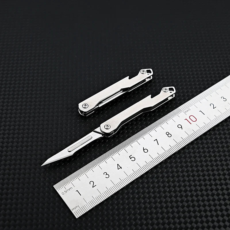 Stainless Steel Folding Utility Knife | Interchangeable Blade, Beer Opener and Self-Defense Tool | Camping and Outdoor Express Box Cutter