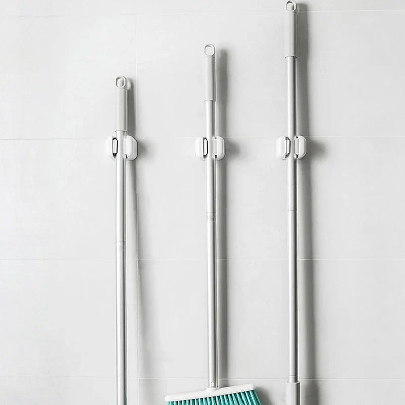 1/4PCS Wall-Mounted Mop Clip Holder — No-Punch Broom & Brush Hanger Rack for Kitchen & Bathroom Organization