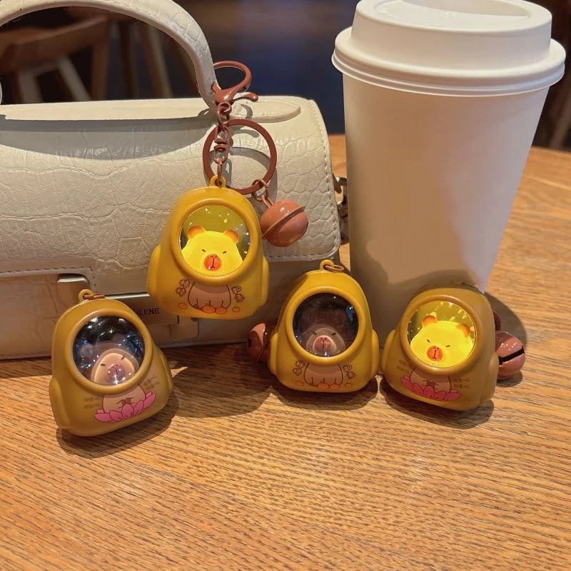 IFYOUOO Luminous Capybara Keychain — Cute Cartoon Space Capsule Keyring for Bags & Gifts
