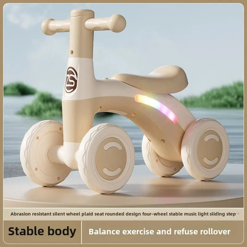 Anti-Tip Baby Balance Bike — 4-Wheel Silent Glider Walker for Ages 1-3, Toddler Training Ride-On with Safety Wheels for Indoor & Outdoor Use