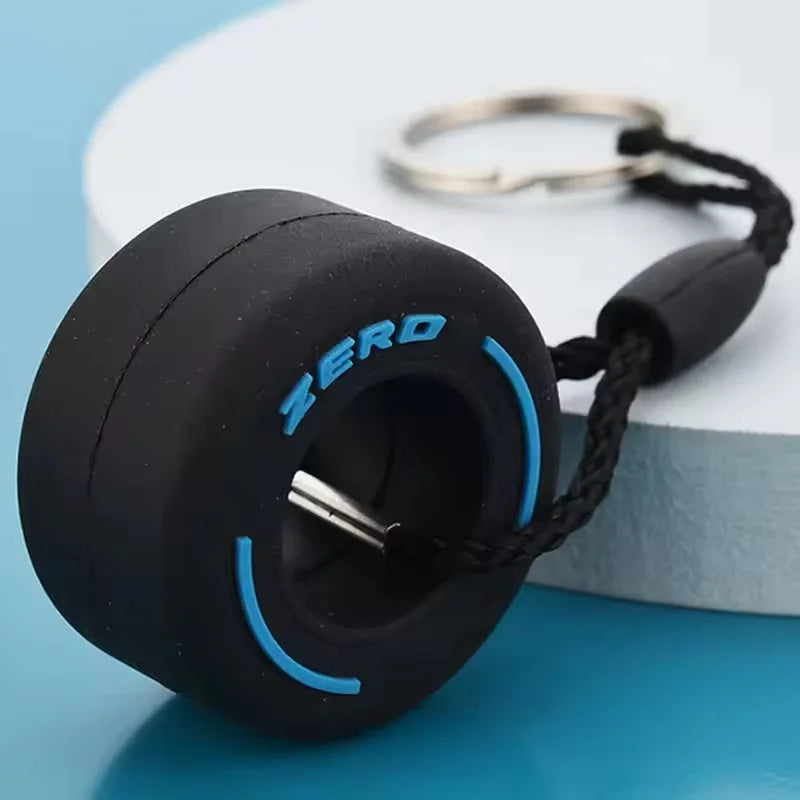 Mini F1 Racing Tire Keychain – Luxury Car Key Accessory & PVC Tire Pendant for Men, Car Lovers & Gifts
