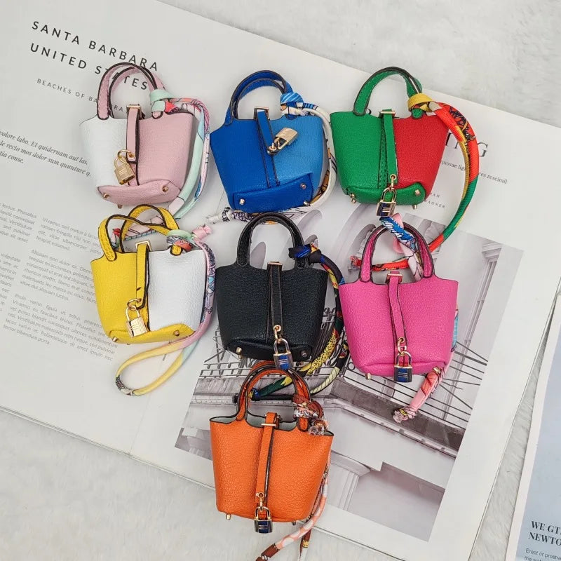Mini Bag Pendant Keychain – Creative Portable Zero Wallet, Bracelet, and Bluetooth Earphone Multifunctional Hanging Accessory