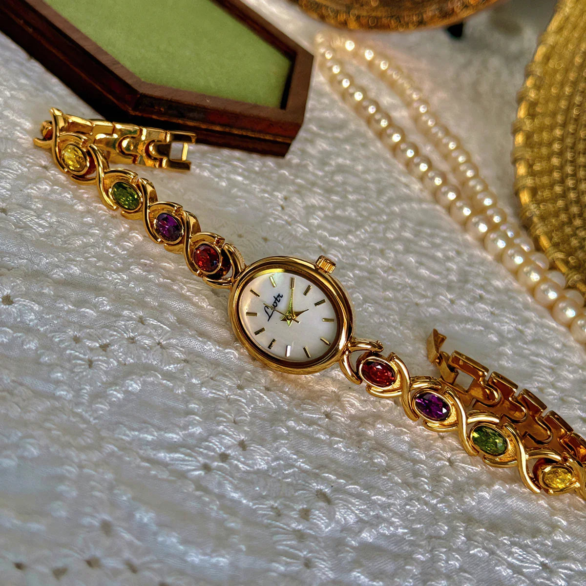 Luxury Women's Watch – Oval Mother-of-Pearl Dial with Tourmalines & Diamond Accents ✨⌚