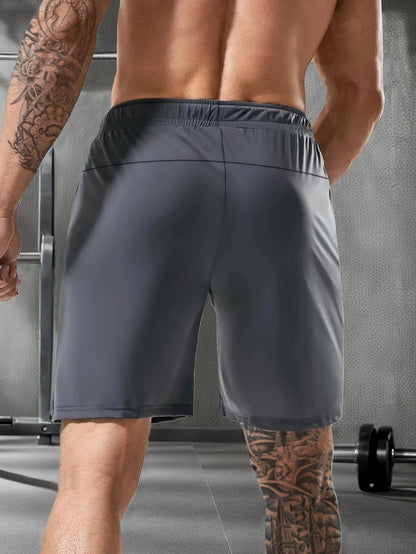 Men’s Solid Color Casual Shorts – Elastic Waist with Drawstring and Zipper Pockets, Loose Fit High Elasticity