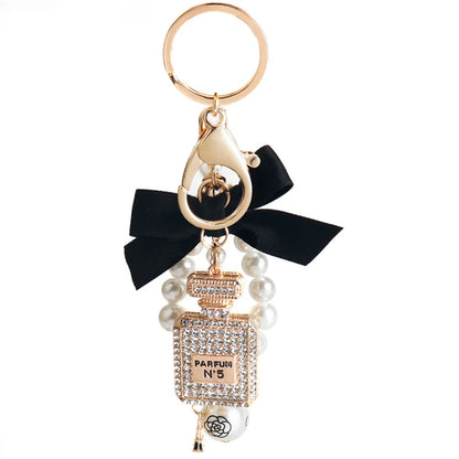 Fashion Pearl Perfume Bottle Keychain — Cute Bow Car & Bag Charm for Women, Creative Key Ring Accessory