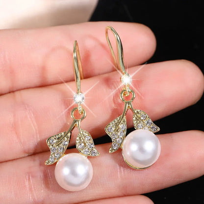 Women’s Silver Bow Earrings with Diamond Pearl – Fashionable High-End Studs